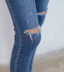 Scratched knee hole jeans thin denim pencil pants feet pants